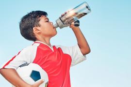 Kid drinking from water bottle
