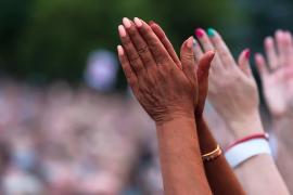 Black and white hands together