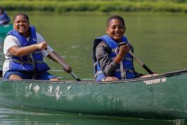 campers in canoe