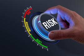 Dial that reads risk with a meter of low to high