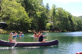 campers canoeing