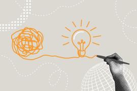 hand drawing a light bulb