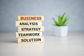 blocks that read business analysis strategy teamwork and solution