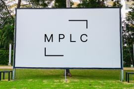 Outdoor movie screen with licensing logo