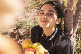 person with apples