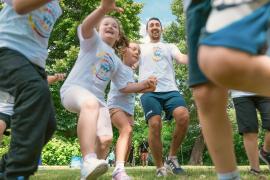 Campers and staff having fun in outdoor activity