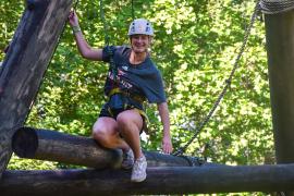 Teen camper on a ropes course