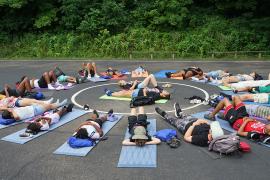 group of campers lying in circle