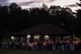Group at night with candles