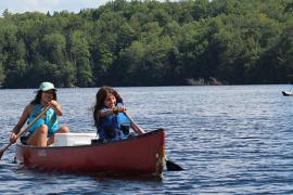 campers canoeing