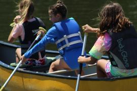 campers in a canoe