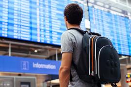 Stock photo of traveler at airport